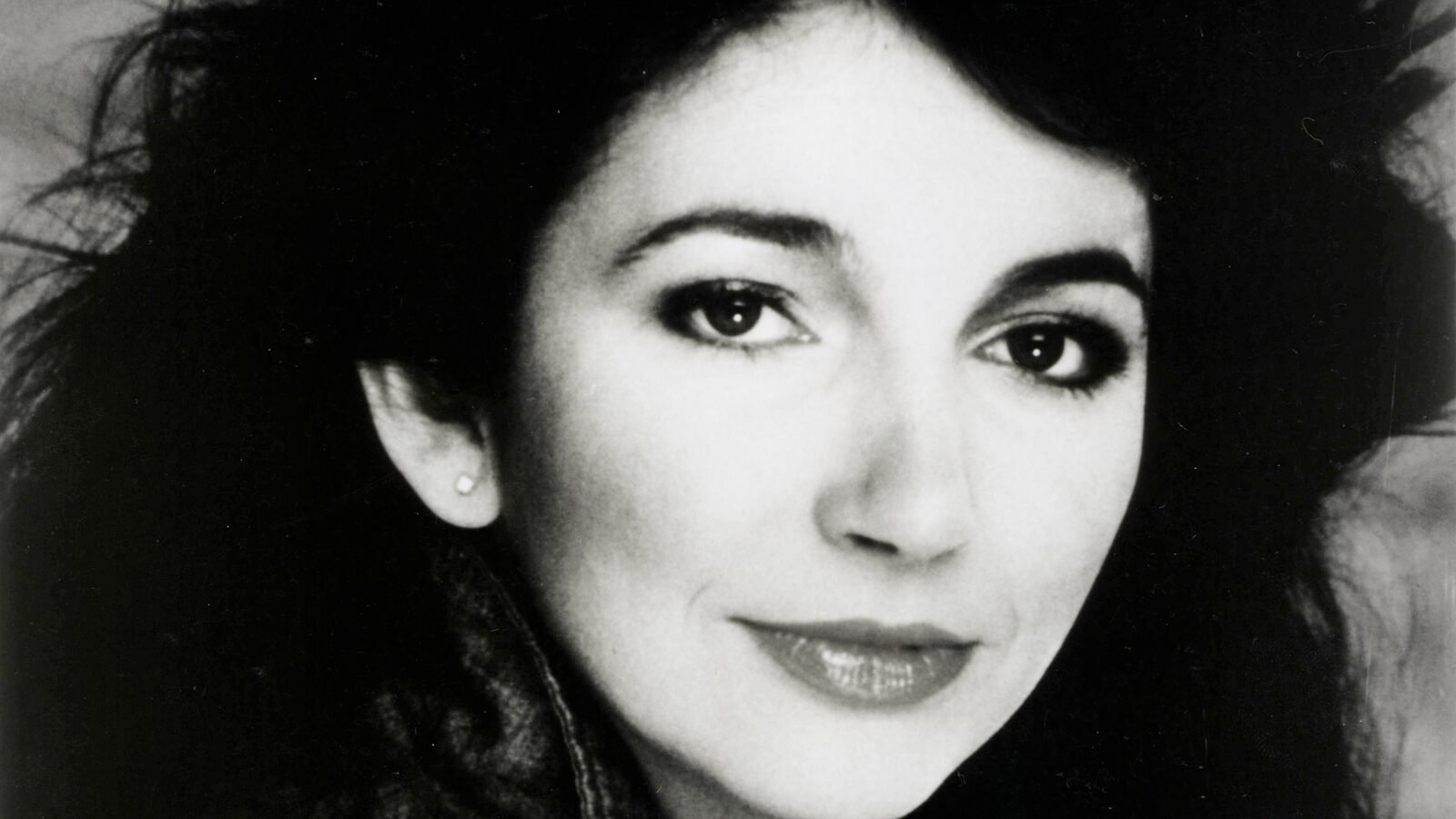 Kate Bush in a black and white 1985 publicity portrait for Hounds of Love
