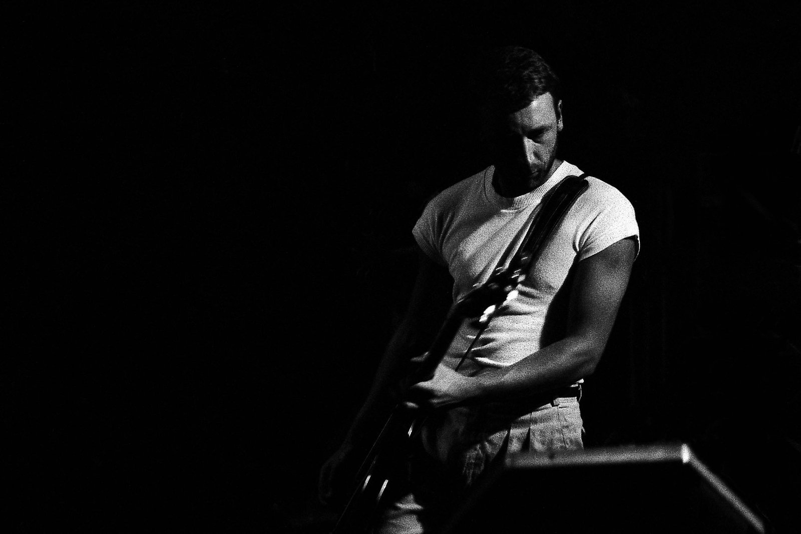 New Order performing live on stage at the SFX club in Dublin in 1983