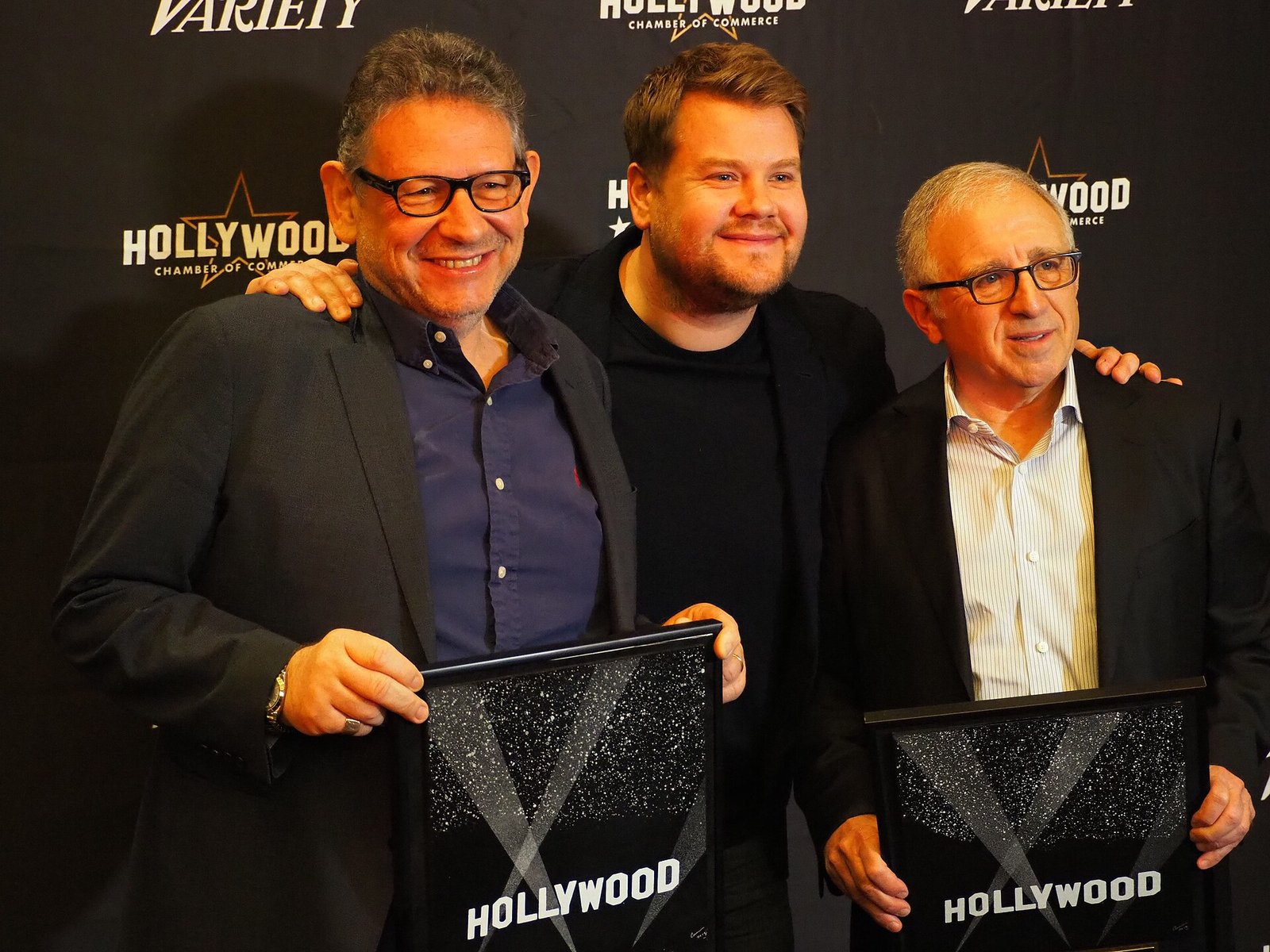 Universal Music Group chief Lucian Grainge, left, with James Corden and Irving Azoff at a Hollywood Chamber of Commerce event in 2018