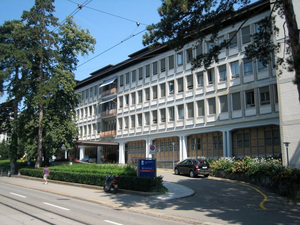 The main entrance building of University Hospital Zurich on a sunny day
