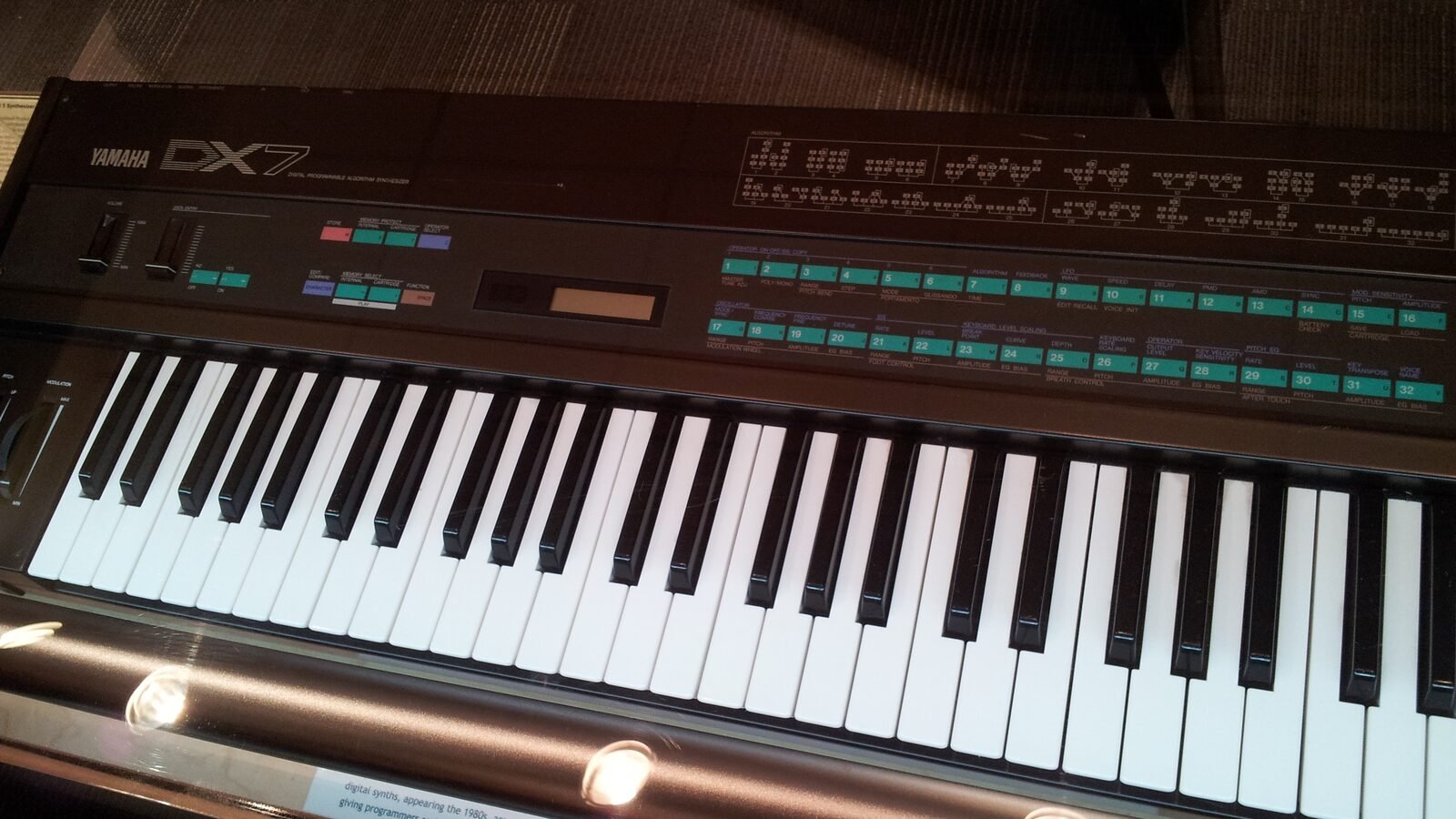 Yamaha DX7 synthesizer keyboard and front panel on display